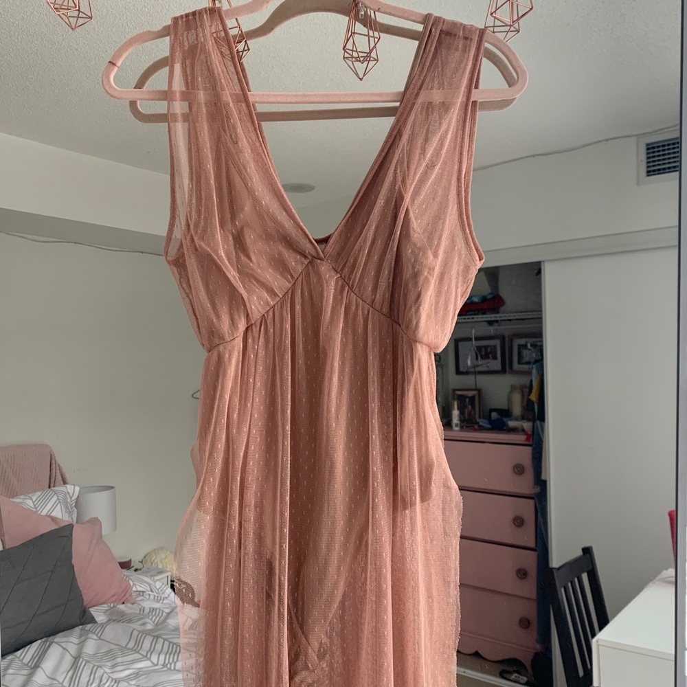 Mesh dress over bodysuit